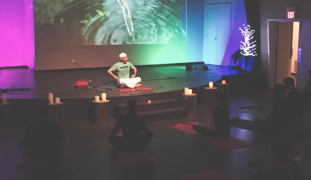 Yoga Mondays at Open Door Church in Maple Ridge, BC. A photo showing the yoga teacher and event in action